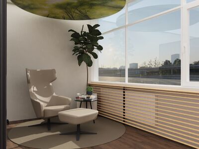 Relaxzone im Büro mit Ohrensessel